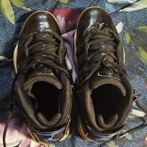 Jordan Black and Gold Sneakers with Sleek Design